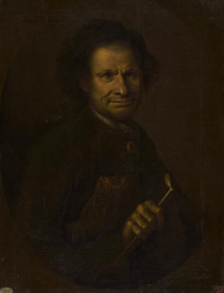 Portrait of a man with a pipe in his hand